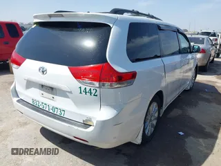 2014 Toyota Sienna LE with VIN 5TDJK3DC5ES081232, listed as a IAAI auction lot 41789629 with 397,033 mi miles and . Bid and sale history available at DreamBid. Image 4.