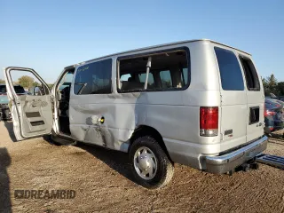 2009 Ford Econoline Passenger XL with VIN 1FMNE11L29DA55878, listed as a Copart auction lot 74945294 with 75,086 mi miles and Salvage title. Bid and sale history available at DreamBid. Image 2.