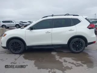 2017 Nissan Rogue S with VIN 5N1AT2MT5HC891159, listed as a IAAI auction lot 42368472 with 174,205 mi miles and . Bid and sale history available at DreamBid. Image 14.