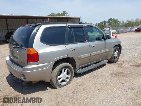 2002 GMC Envoy SLT with VIN 1GKDS13S422446808, listed as a IAAI auction lot 41896943 with 271,771 mi miles. Bid and sale history available at carsss.com. Image 4.