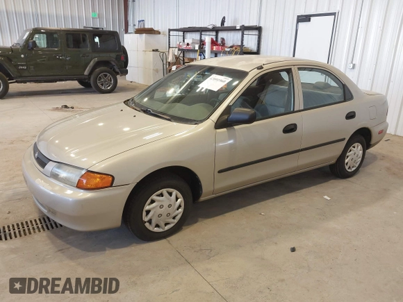 1997 Mazda Protege DX z VIN JM1BC1415V0133823, wystawiony jako IAAI lot #42091960 z przebiegiem 149 959 mil mil oraz . Historia ofert i sprzedaży dostępna na DreamBid. Obrazek 2.
