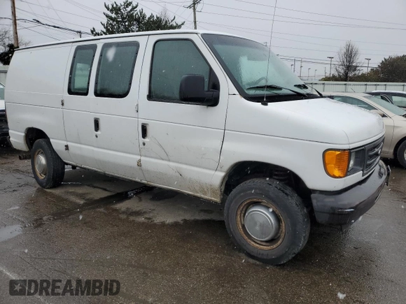2004 Ford Econoline Cargo with VIN 1FTNE24L04HA33417, listed as a Copart auction lot 85720904 with 129,070 mi miles and Salvage title. Bid and sale history available at DreamBid. Image 4.