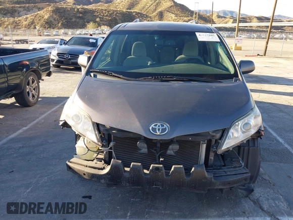 2015 Toyota Sienna LE AAS with VIN 5TDKK3DC3FS529845, listed as a IAAI auction lot 41627102 with 130,334 mi miles. Bid and sale history available at carsss.com. Image 13.