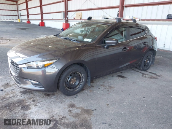 2018 Mazda 3 Touring with VIN 3MZBN1L35JM229453, listed as a IAAI auction lot 42123176 with 113,051 mi miles and . Bid and sale history available at DreamBid. Image 2.