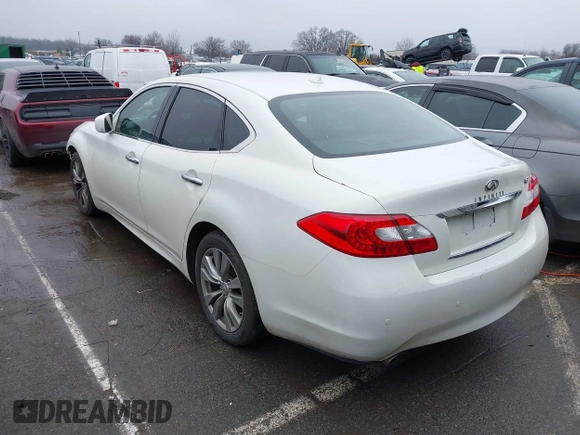 2013 Infiniti M with VIN JN1BY1AP2DM511813, listed as a IAAI auction lot 41577968 with 191,608 mi miles and . Bid and sale history available at DreamBid. Image 3.