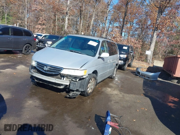 2004 Honda Odyssey EX z VIN 5FNRL18674B080319, wystawiony jako IAAI lot #40819411 z przebiegiem 201 820 mil mil oraz . Historia ofert i sprzedaży dostępna na DreamBid. Obrazek 18.