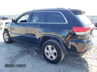 2017 Jeep Grand Cherokee Laredo with VIN 1C4RJEAG4HC952605, listed as a Copart auction lot 56693145 with 115,035 mi miles and Salvage title. Bid and sale history available at DreamBid. Image 2.