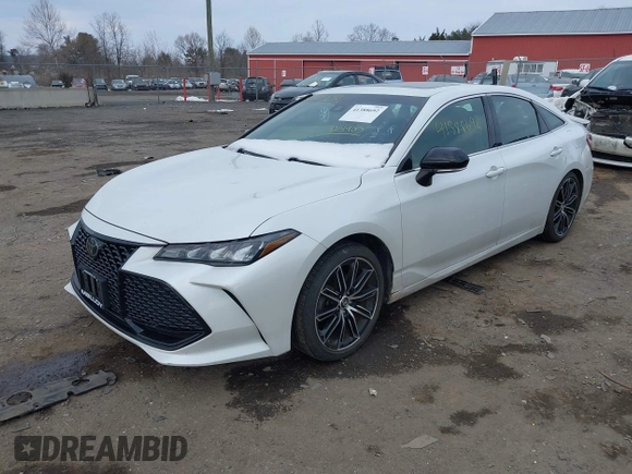 2019 Toyota Avalon XLE with VIN 4T1BZ1FB5KU014903, listed as a IAAI auction lot 41388692 with 100,599 mi miles. Bid and sale history available at carsss.com. Image 2.