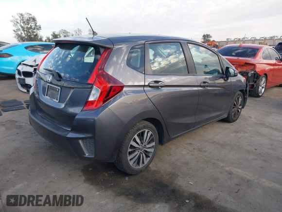2015 Honda Fit LX with VIN 3HGGK5H5XFM719477, listed as a IAAI auction lot 41671194 with 145,876 mi miles. Bid and sale history available at carsss.com. Image 4.