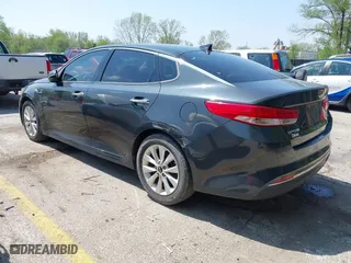 2016 Kia Optima EX with VIN 5XXGU4L38GG022501, listed as a IAAI auction lot 42071944 with 122,502 mi miles. Bid and sale history available at carsss.com. Image 3.