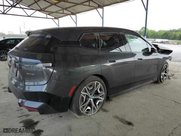 2022 BMW iX xDrive50 with VIN WB523CF02NCJ71343, listed as a Copart auction lot 53404674 with 14,917 mi miles and Salvage Title. Bid and sale history available at carsss.com. Image 3.