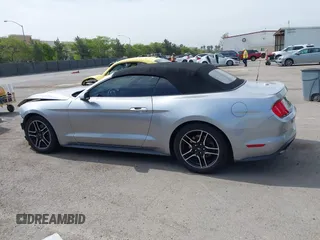 2020 Ford Mustang EcoBoost z VIN 1FATP8UH6L5131602, wystawiony jako IAAI lot #42228919 z przebiegiem 82 807 mil mil oraz . Historia ofert i sprzedaży dostępna na DreamBid. Obrazek 15.
