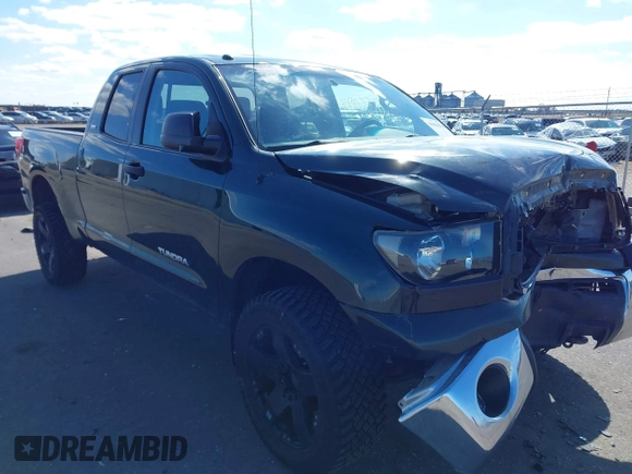 2011 Toyota Tundra 4WD Truck with VIN 5TFUM5F18BX020803, listed as a IAAI auction lot 41856078 with 110,119 mi miles. Bid and sale history available at carsss.com. Image 1.