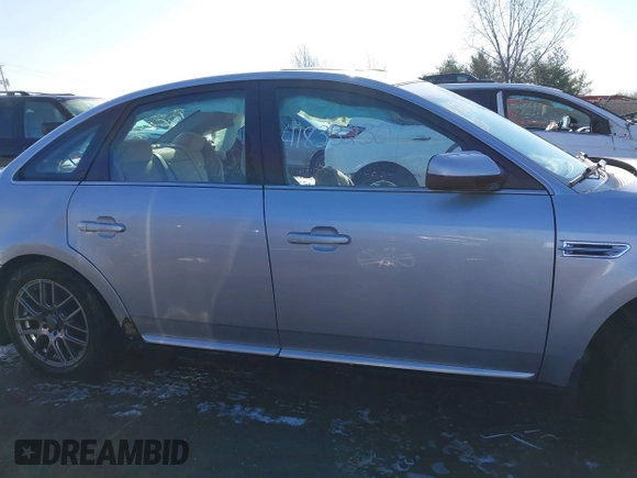 2009 Ford Taurus SEL with VIN 1FAHP24W79G106500, listed as a IAAI auction lot 41833230 with 133,055 mi miles. Bid and sale history available at carsss.com. Image 14.