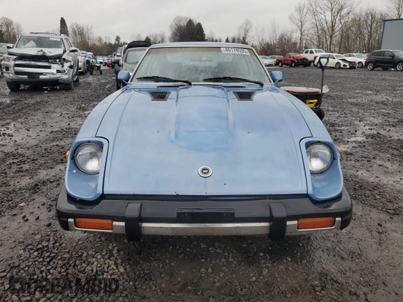1979 Datsun 280ZX z VIN HS130107311, wystawiony jako Copart lot #46178505 z przebiegiem 71 627 mil mil oraz Tytuł czysty. Historia ofert i sprzedaży dostępna na DreamBid. Obrazek 5.