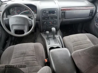 2000 Jeep Grand Cherokee Laredo z VIN 1J4GW48S1YC326453, wystawiony jako Copart lot #57332675 z przebiegiem 290 059 mil mil oraz Czysty tytuł • Clean title. Historia ofert i sprzedaży dostępna na DreamBid. Obrazek 8.