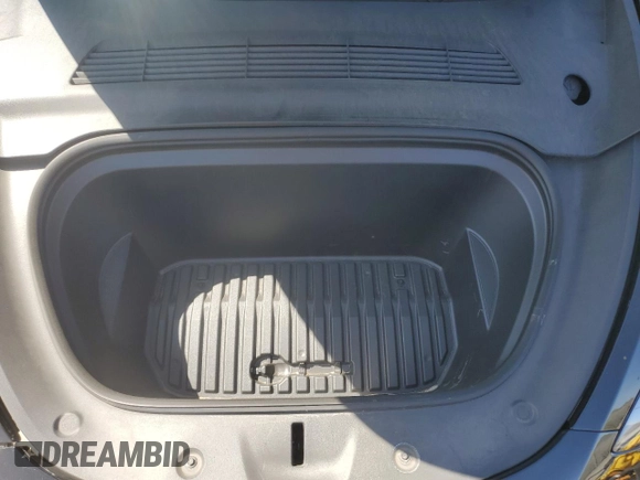 2023 Tesla Model Y Long Range with VIN 7SAYGAEE0PF642810, listed as a Copart auction lot 52181655 with 74,922 mi miles and Salvage Title. Bid and sale history available at DreamBid. Image 13.