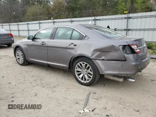 2014 Ford Taurus Limited with VIN 1FAHP2F84EG115535, listed as a Copart auction lot 51953305 with 126,632 mi miles and Salvage Title. Bid and sale history available at DreamBid. Image 2.
