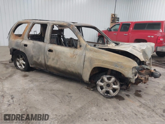 2005 GMC Envoy SLT z VIN 1GKDT13S752254350, wystawiony jako IAAI lot #41301432 z przebiegiem Nie podano mil oraz . Historia ofert i sprzedaży dostępna na DreamBid. Obrazek 1.