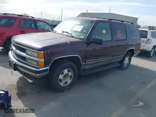 1996 Chevrolet Tahoe with VIN 1GNEK13R3TJ397046, listed as a IAAI auction lot 41702588 with 1 mi miles. Bid and sale history available at carsss.com. Image 2.