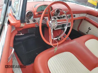 1956 Ford Thunderbird with VIN P6GH329799, listed as a Copart auction lot 74238794 with 75,811 mi miles and Salvage Title. Bid and sale history available at DreamBid. Image 8.