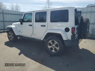 2017 Jeep Wrangler Unlimited 75th Anniversary z VIN 1C4BJWEG6HL636575, wystawiony jako Copart lot #54149875 z przebiegiem 129 721 mil mil oraz Szkoda całkowita • Salvage title. Historia ofert i sprzedaży dostępna na DreamBid. Obrazek 2.