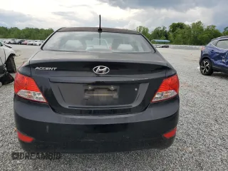 2012 Hyundai Accent GLS z VIN KMHCT4AEXCU041024, wystawiony jako Copart lot #54057455 z przebiegiem 219 530 mil mil oraz Szkody całkowita. Historia ofert i sprzedaży dostępna na DreamBid. Obrazek 6.