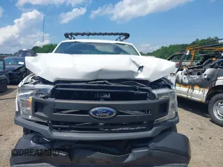 2018 Ford F-150 XL with VIN 1FTEX1CB5JFE55932, listed as a IAAI auction lot 42298917 with 143,923 mi miles and . Bid and sale history available at DreamBid. Image 12.