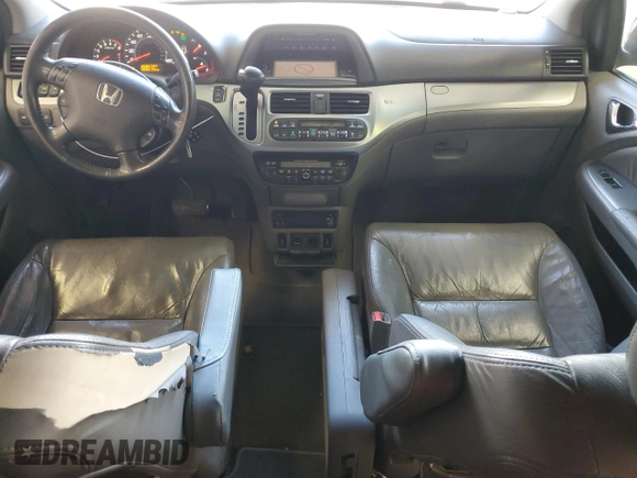 2010 Honda Odyssey Touring with VIN 5FNRL3H9XAB067890, listed as a Copart auction lot 63520575 with 213,582 mi miles and Clean title. Bid and sale history available at DreamBid. Image 8.