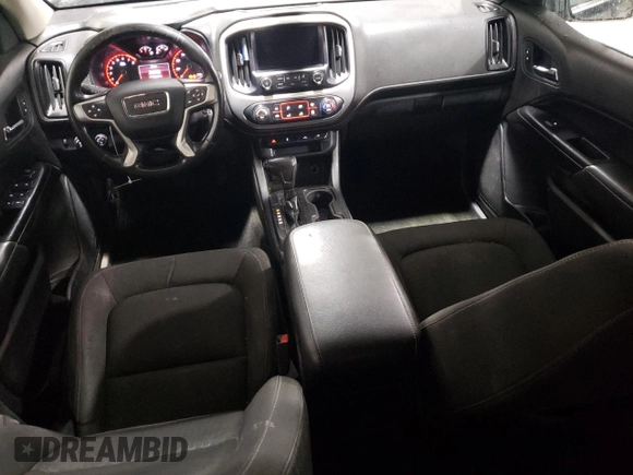2015 GMC Canyon 4WD SLE with VIN 1GTG6BE38F1258880, listed as a Copart auction lot 57887664 with 142,346 mi miles and Salvage Title. Bid and sale history available at carsss.com. Image 8.
