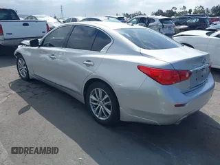 2014 Infiniti Q50 Premium z VIN JN1BV7AP9EM684709, wystawiony jako IAAI lot #41901877 z przebiegiem 91 425 mil mil oraz . Historia ofert i sprzedaży dostępna na DreamBid. Obrazek 3.