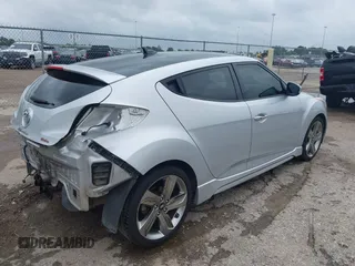 2013 Hyundai Veloster Turbo z VIN KMHTC6AE2DU122273, wystawiony jako IAAI lot #42174272 z przebiegiem 157 152 mil mil oraz . Historia ofert i sprzedaży dostępna na DreamBid. Obrazek 4.