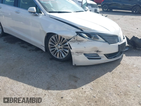 2016 Lincoln MKZ z VIN 3LN6L2G98GR618707, wystawiony jako IAAI lot #42569269 z przebiegiem 159 545 mil mil oraz . Historia ofert i sprzedaży dostępna na DreamBid. Obrazek 6.