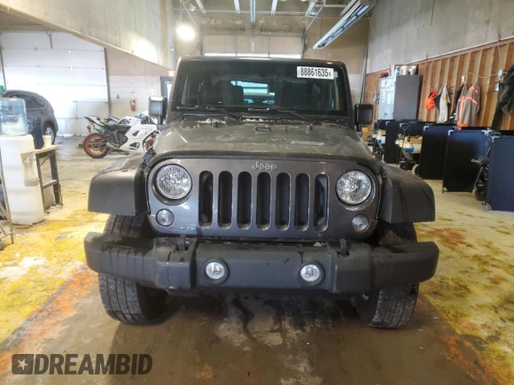 2017 Jeep Wrangler Willys Wheeler with VIN 1C4AJWAG3HL751703, listed as a Copart auction lot 88861635 with 14,114 mi miles and Salvage Title. Bid and sale history available at DreamBid. Image 5.