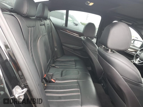 2019 BMW 5 Series 540i xDrive with VIN WBAJE7C54KWW19994, listed as a Copart auction lot 57973055 with 121,995 mi miles and Salvage title. Bid and sale history available at DreamBid. Image 10.