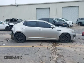 2015 Kia Optima SX with VIN 5XXGR4A73FG372494, listed as a IAAI auction lot 42345043 with 196,911 mi miles and . Bid and sale history available at DreamBid. Image 13.