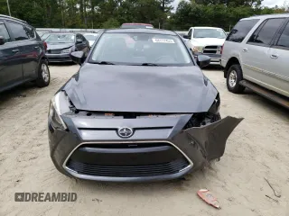 2016 Scion iA z VIN 3MYDLBZV6GY101015, wystawiony jako Copart lot #68777453 z przebiegiem 112 517 mil mil oraz . Historia ofert i sprzedaży dostępna na DreamBid. Obrazek 5.