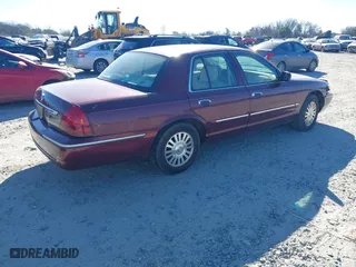 2006 Mercury Grand Marquis LS Premium with VIN 2MEFM75V06X622375, listed as a IAAI auction lot 41686035 with 165,495 mi miles. Bid and sale history available at carsss.com. Image 4.