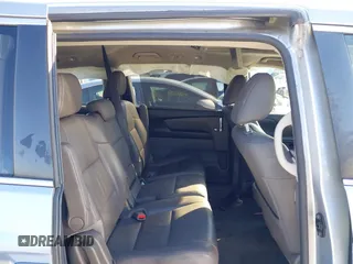 2017 Honda Odyssey EX-L with VIN 5FNRL5H6XHB003389, listed as a IAAI auction lot 41329731 with 203,368 mi miles and . Bid and sale history available at DreamBid. Image 8.
