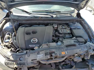2018 Mazda 3 Touring z VIN 3MZBN1V35JM238103, wystawiony jako Copart lot #56770875 z przebiegiem 66 747 mil mil oraz Szkoda całkowita • Salvage title. Historia ofert i sprzedaży dostępna na DreamBid. Obrazek 11.