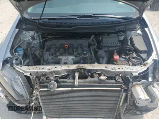 2014 Honda Civic LX z VIN 19XFB2F57EE014804, wystawiony jako Copart lot #59690565 z przebiegiem 208 650 mil mil oraz Szkoda całkowita • Salvage title. Historia ofert i sprzedaży dostępna na DreamBid. Obrazek 11.