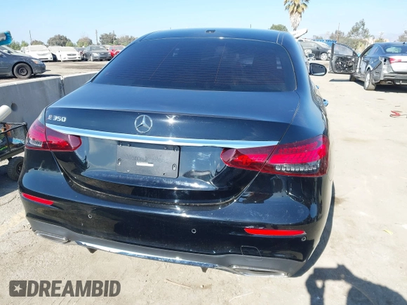 2021 Mercedes-Benz E-Class E 350 with VIN W1KZF8DB0MA889890, listed as a IAAI auction lot 41317094 with 63,075 mi miles. Bid and sale history available at carsss.com. Image 16.