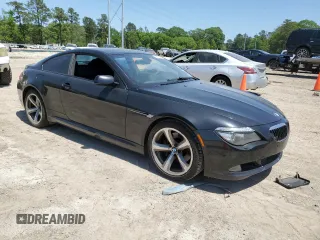 2009 BMW 6 Series 650i z VIN WBAEA535X9CV92734, wystawiony jako Copart lot #52678395 z przebiegiem 237 588 mil mil oraz Czysty tytuł • Clean title. Historia ofert i sprzedaży dostępna na DreamBid. Obrazek 4.