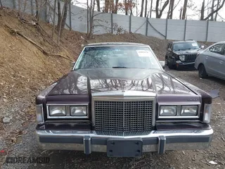 1987 Lincoln Town Car with VIN 1LNBM81F5HY704217, listed as a IAAI auction lot 41855678 with 86,794 mi miles. Bid and sale history available at carsss.com. Image 17.