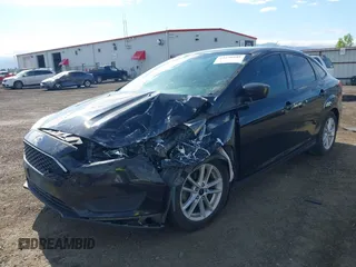 2018 Ford Focus SE z VIN 1FADP3F20JL288437, wystawiony jako IAAI lot #42278885 z przebiegiem 132 504 mil mil oraz . Historia ofert i sprzedaży dostępna na DreamBid. Obrazek 17.