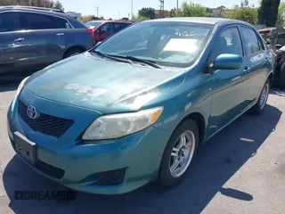 2009 Toyota Corolla with VIN 1NXBU40E39Z047881, listed as a IAAI auction lot 42078719 with 204,258 mi miles. Bid and sale history available at carsss.com. Image 2.