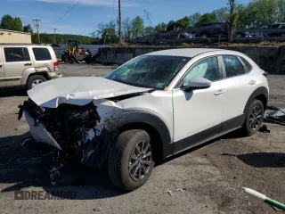 2023 Mazda CX-30 S with VIN 3MVDMBAM0PM506565, listed as a Copart auction lot 57699125 with 7,345 mi miles and Salvage title. Bid and sale history available at DreamBid. Image 1.