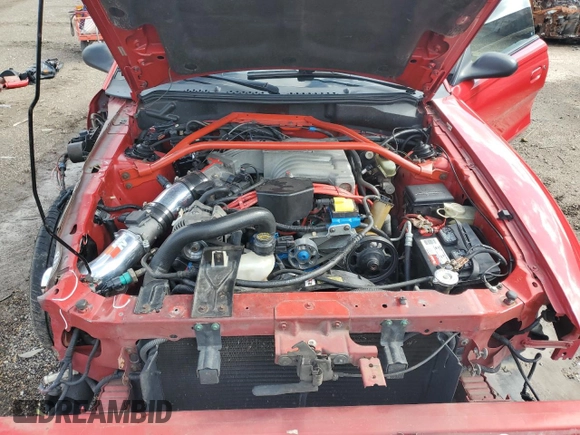 1995 Ford Mustang z VIN 1FALP45T5SF135550, wystawiony jako Copart lot #60662725 z przebiegiem 92 902 mil mil oraz Szkoda całkowita • Salvage title. Historia ofert i sprzedaży dostępna na DreamBid. Obrazek 11.