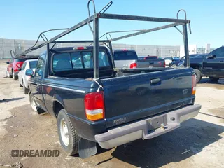 1997 Ford Ranger XLT z VIN 1FTCR10A4VTA44803, wystawiony jako IAAI lot #42479081 z przebiegiem 162 346 mil mil oraz . Historia ofert i sprzedaży dostępna na DreamBid. Obrazek 3.