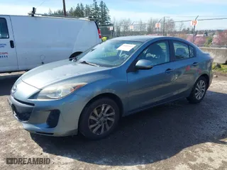 2012 Mazda Mazda3 i Grand Touring with VIN JM1BL1W81C1670836, listed as a IAAI auction lot 41885507 with 242,280 mi miles. Bid and sale history available at carsss.com. Image 2.